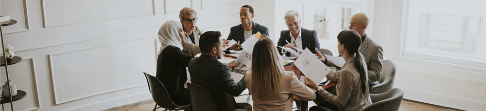 Group of people sitting around a table